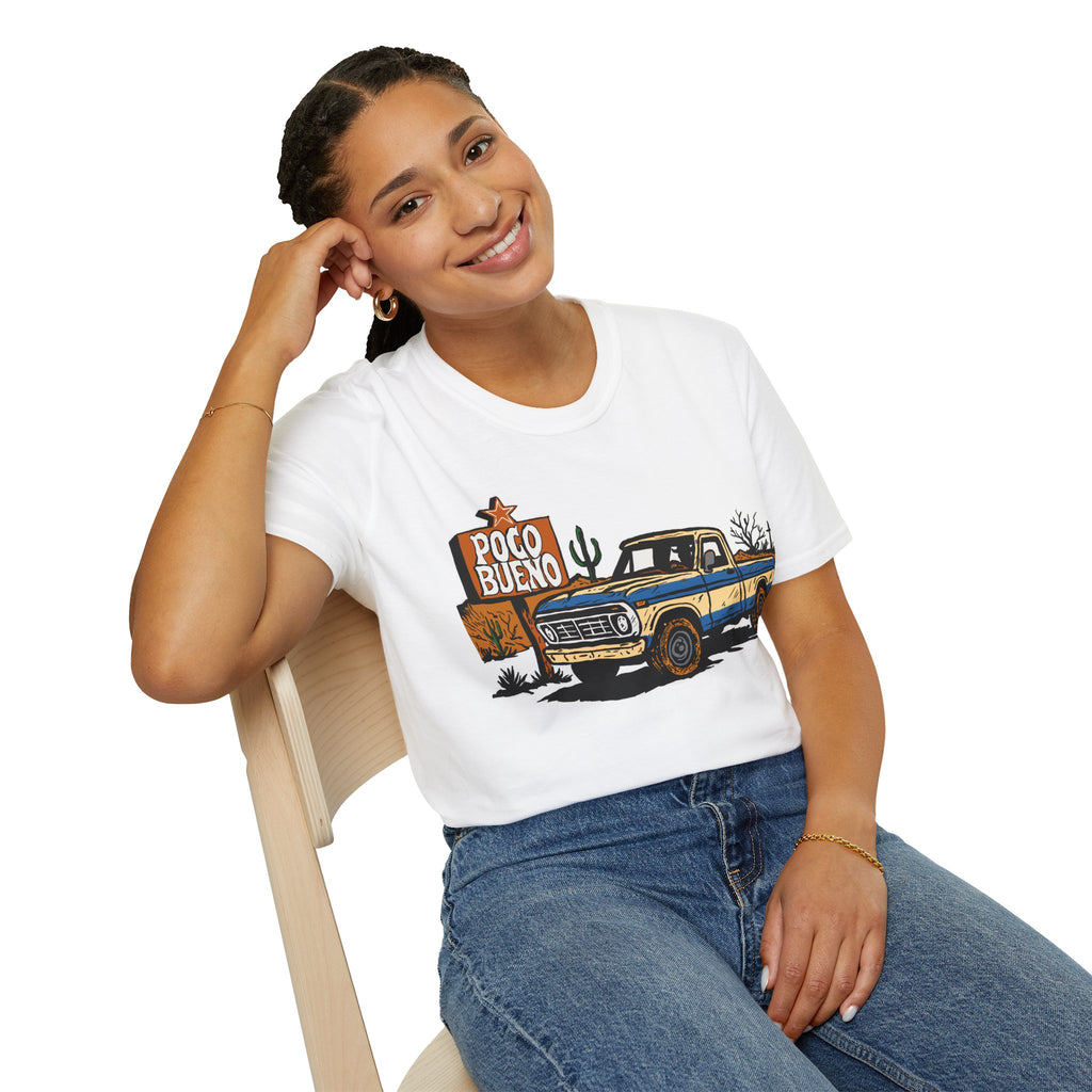 Person wearing a white t-shirt with a graphic design of a truck and 'Poco Bueno' sign.